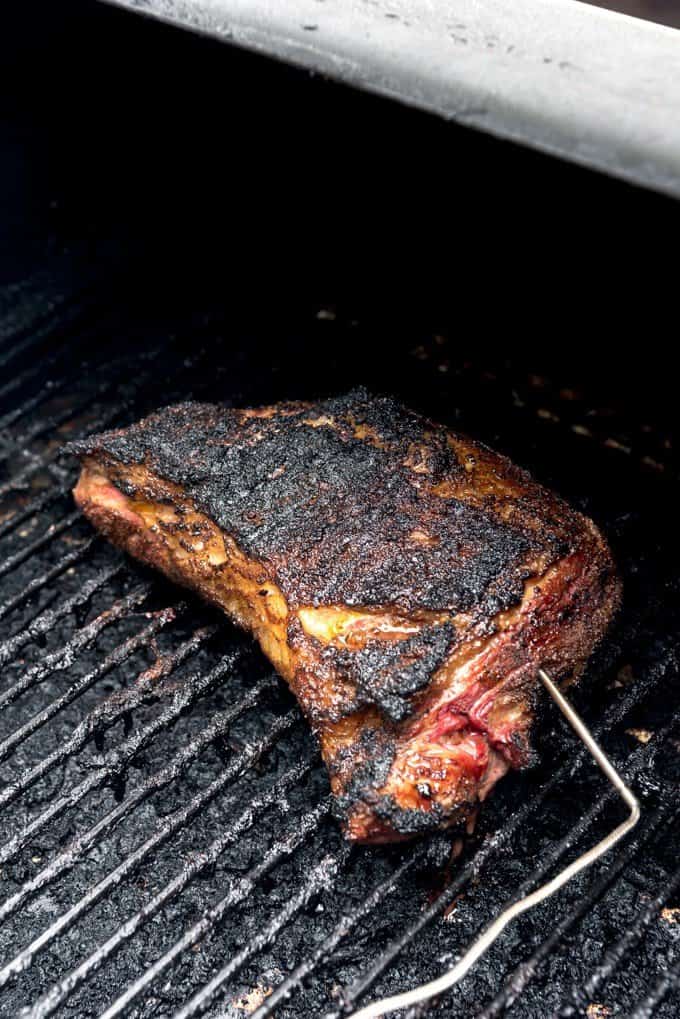 An image of a grilled Santa Maria Tri-Tip on the grill with an instant read meat thermometer inserted into it..