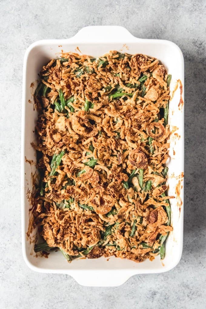 An image of green bean casserole without cream of mushroom soup, topped with crispy French's fried onions.