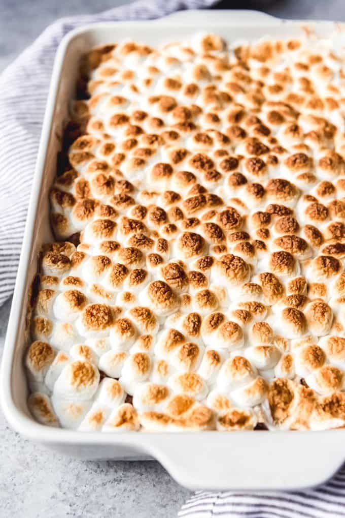 An image of a pan of classic sweet potato casserole with marshmallows.