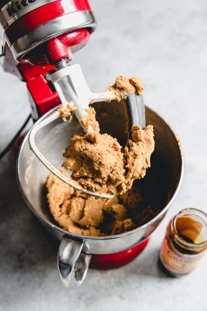 An image of soft molasses ginger cookie dough on the beater ready to be baked.