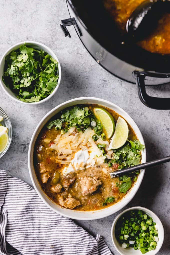 An image of a bowl of pork chili verde made in a slow cooker.