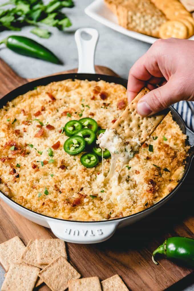 An image of bacon jalapeno popper dip with panko breadcrumb topping.