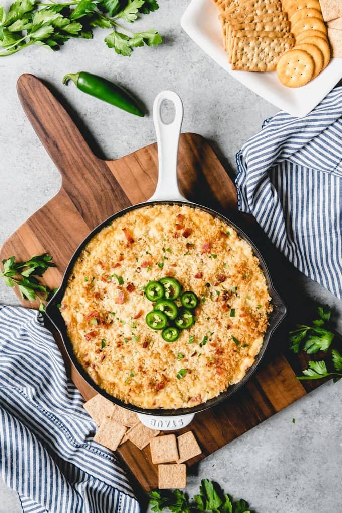 An image of the best jalapeno popper dip recipe made in a cast iron pan.