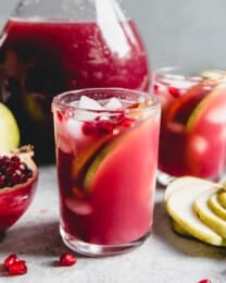 A glass of pomegranate in a pear tree punch.