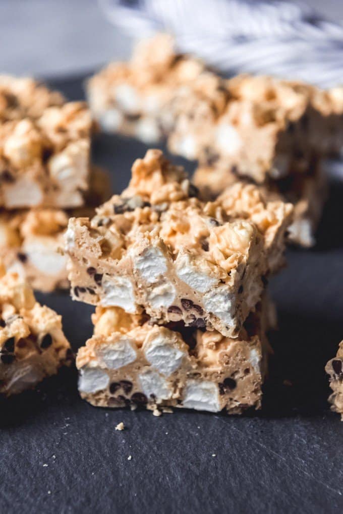 An image of copycat Rocky Mountain Avalanche Bars with plenty of marshmallows, peanut butter and white chocolate, and mini chocolate chips.