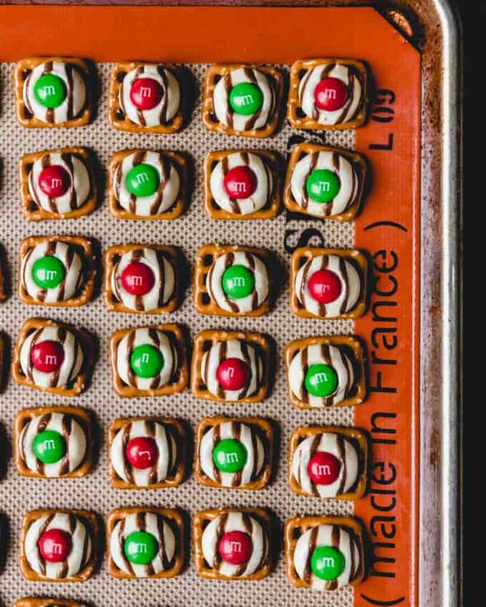 Prepared Christmas hugs on a silicone lined baking sheet.