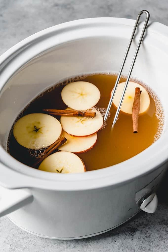 An image of homemade apple cider in a slow cooker