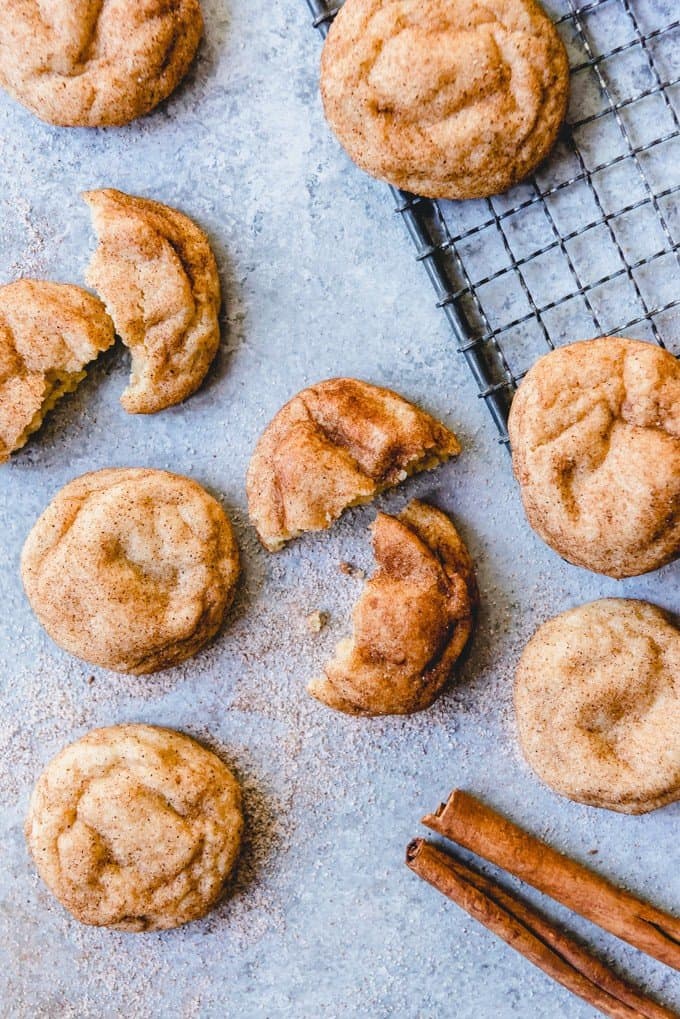 An image of the best snickerdoodle recipe made with cinnamon, sugar, butter, and cream of tartar.