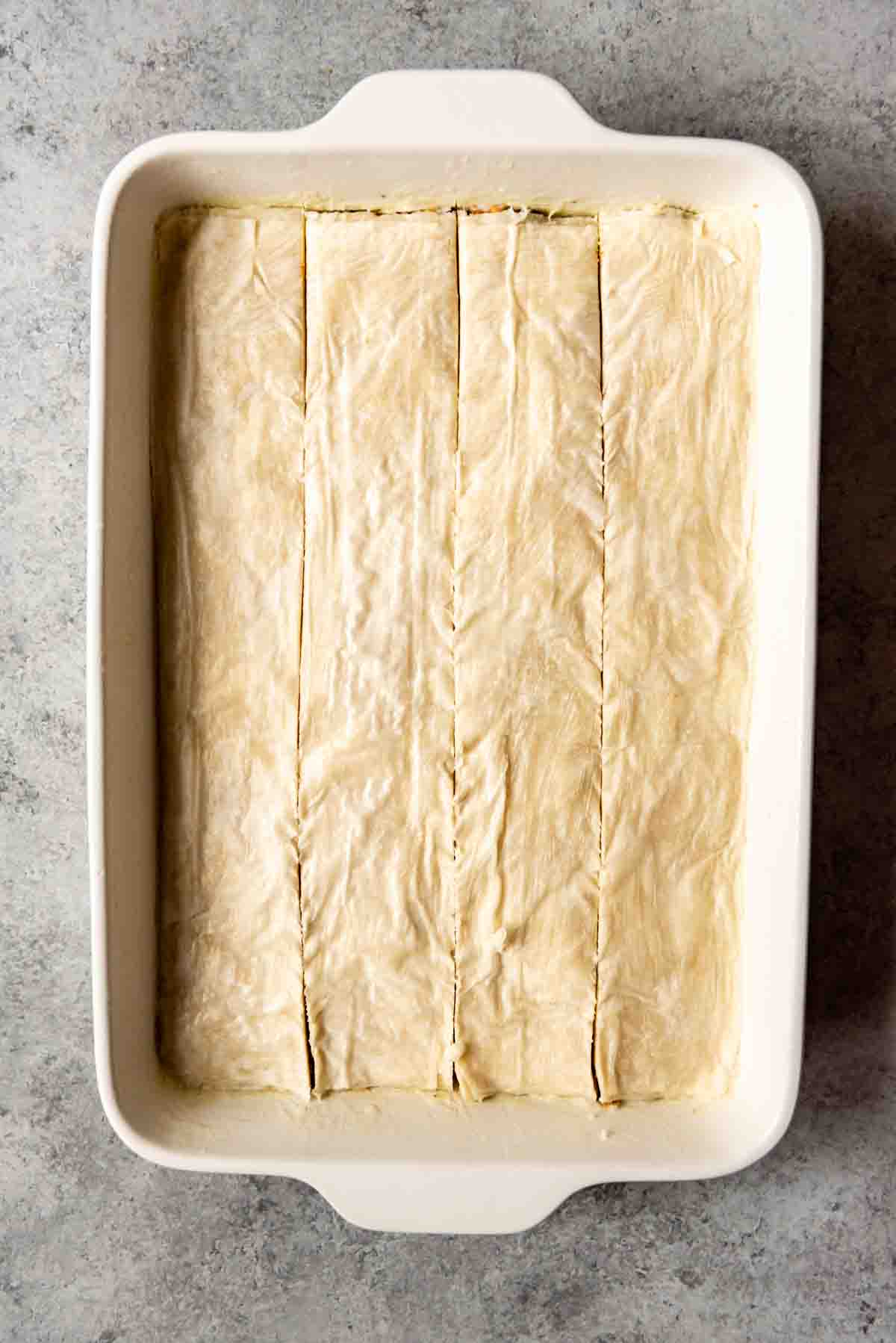 A pan of unbaked baklava.