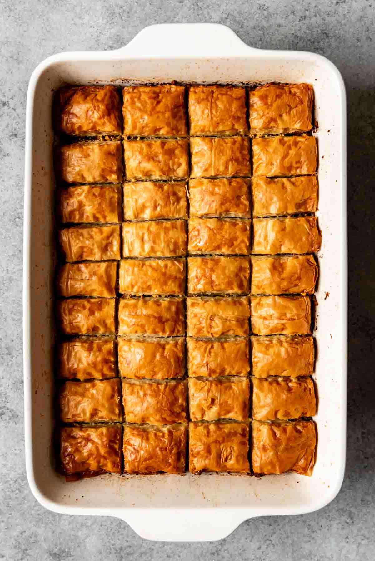 Baked baklava in a pan before adding the syrup.