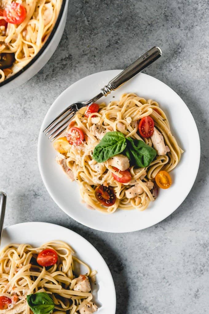 An image of a plate of perfectly al dente linguine noodles with chicken and bruschetta flavors for a one pot bruschetta chicken pasta recipe.