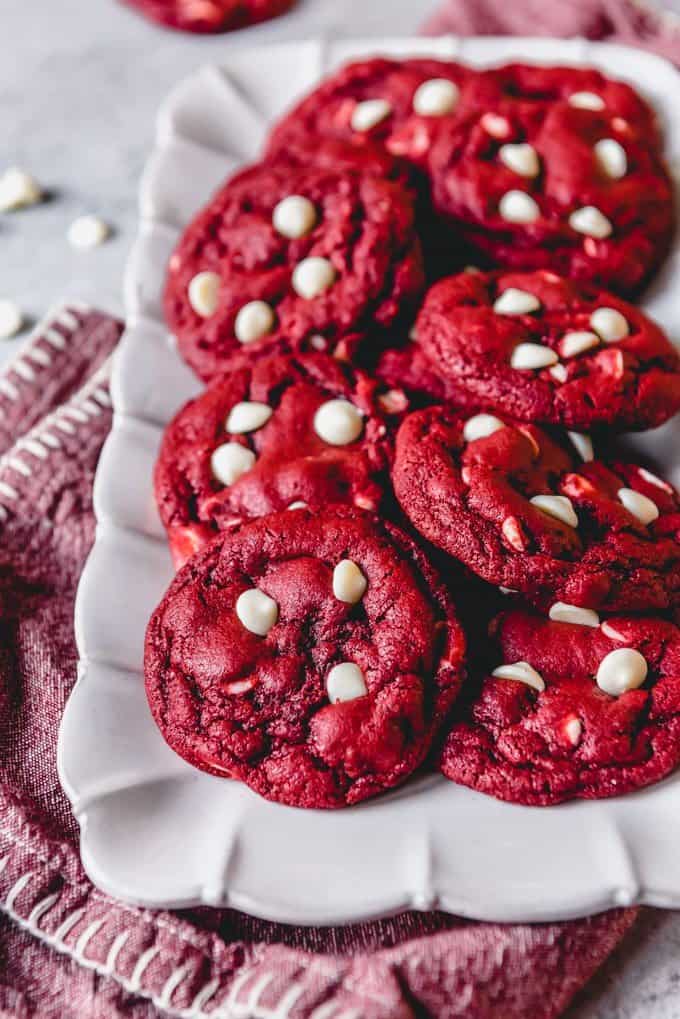 white chocolate chip red velvet cookies on a long white plate