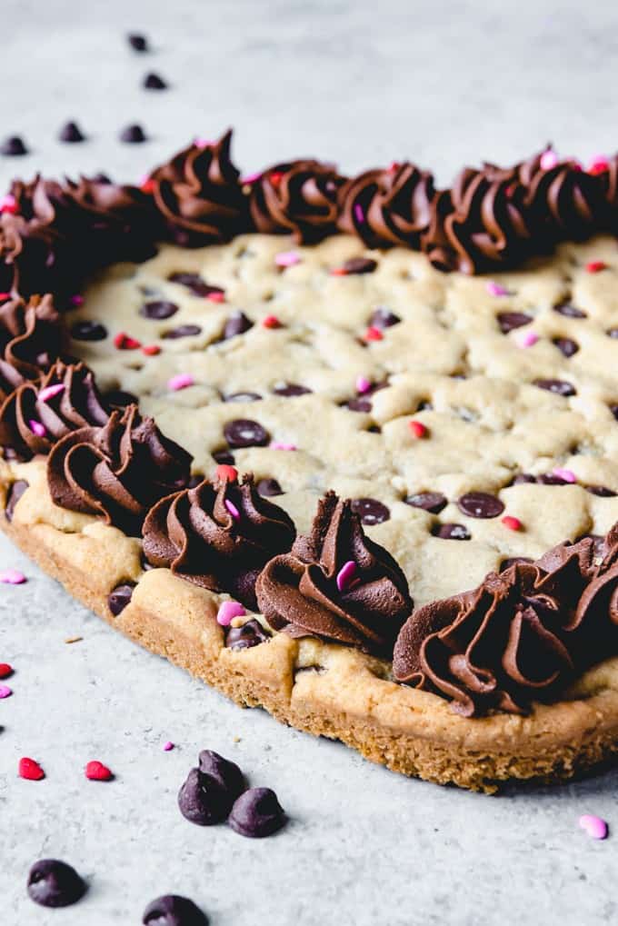 An image of a giant cookie frosted with chocolate buttercream.