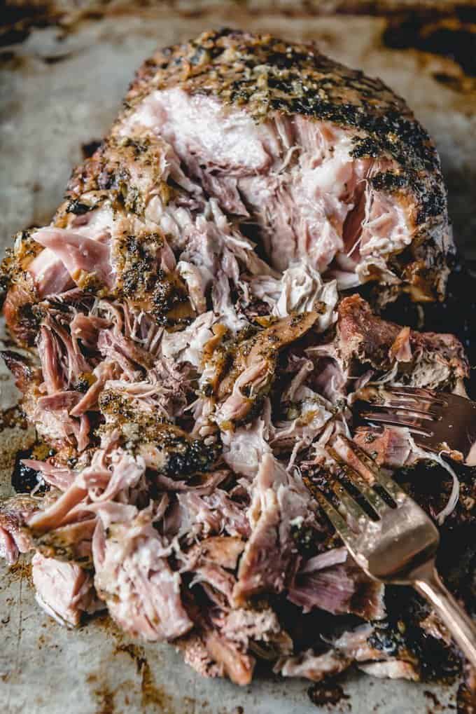 Slow Roasted Cuban Mojo Pork that has been shredded with two forks makes the best cubanos.