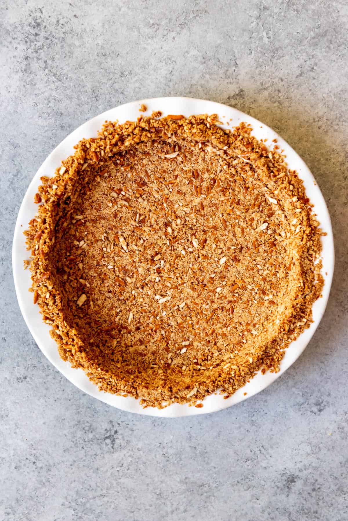 An overhead image of a pretzel crust.