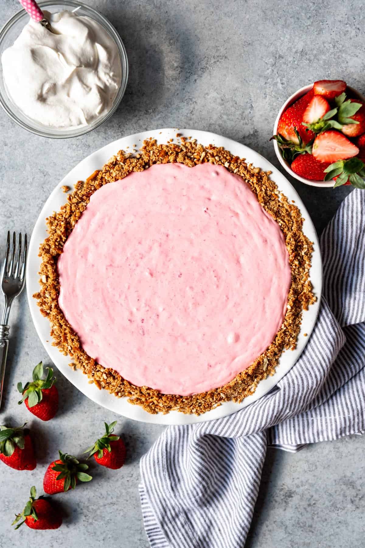 Strawberry mousse filling in a pretzel crust.