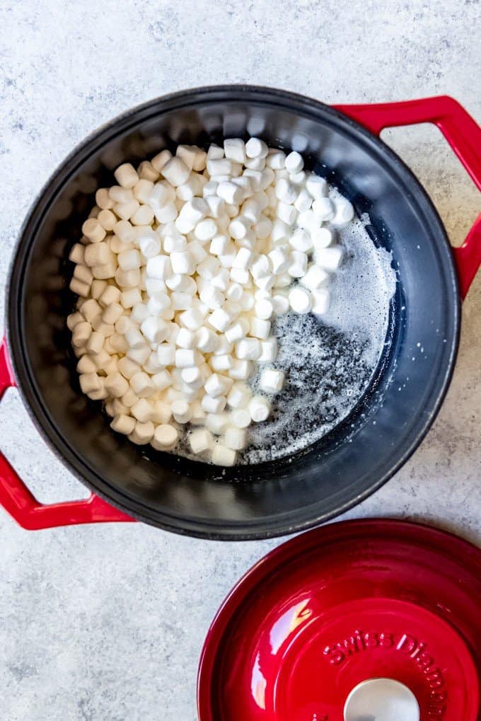 An image of marshmallows and butter in a heavy pan for making marshmallow popcorn balls.