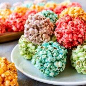 An image of colorful marshmallow popcorn balls made with Jello.