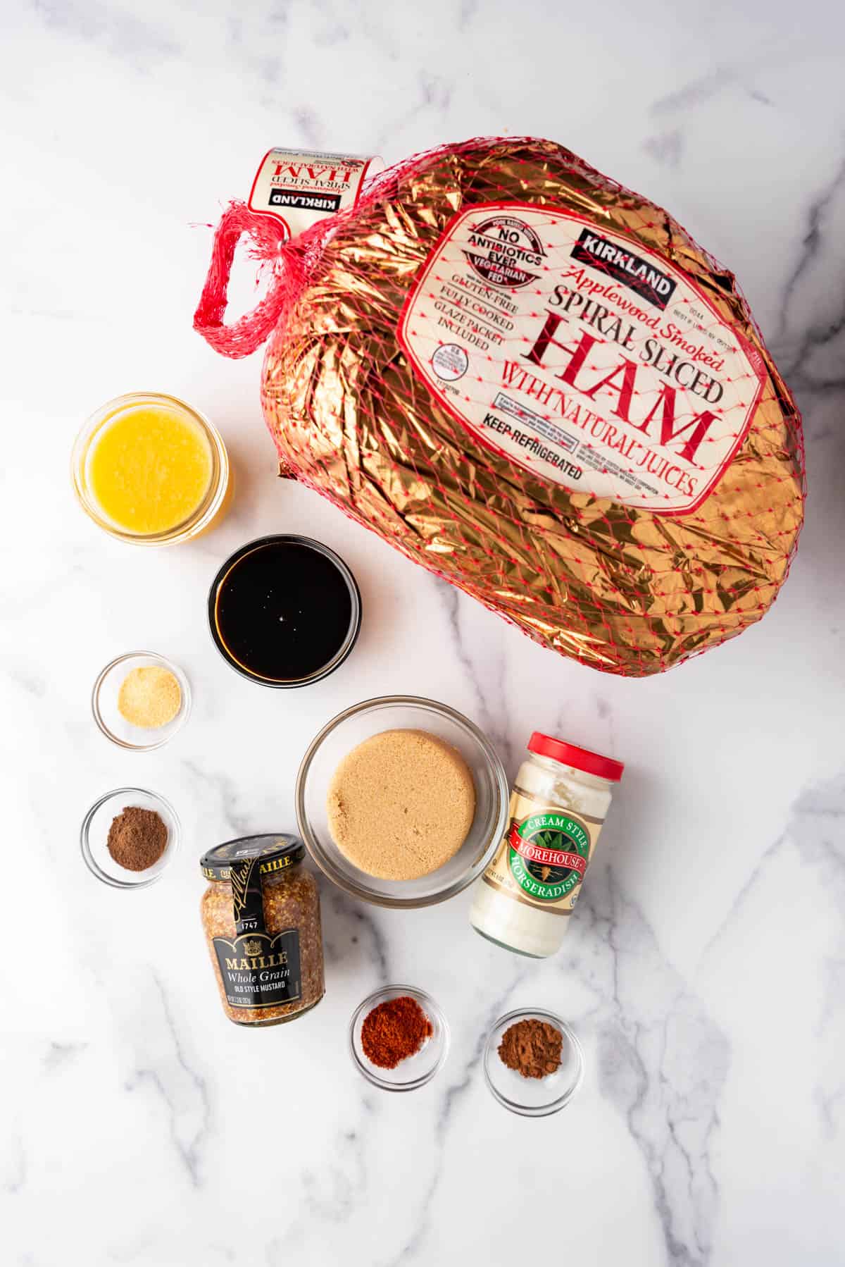 An overhead image of ingredients for making brown sugar glazed ham.
