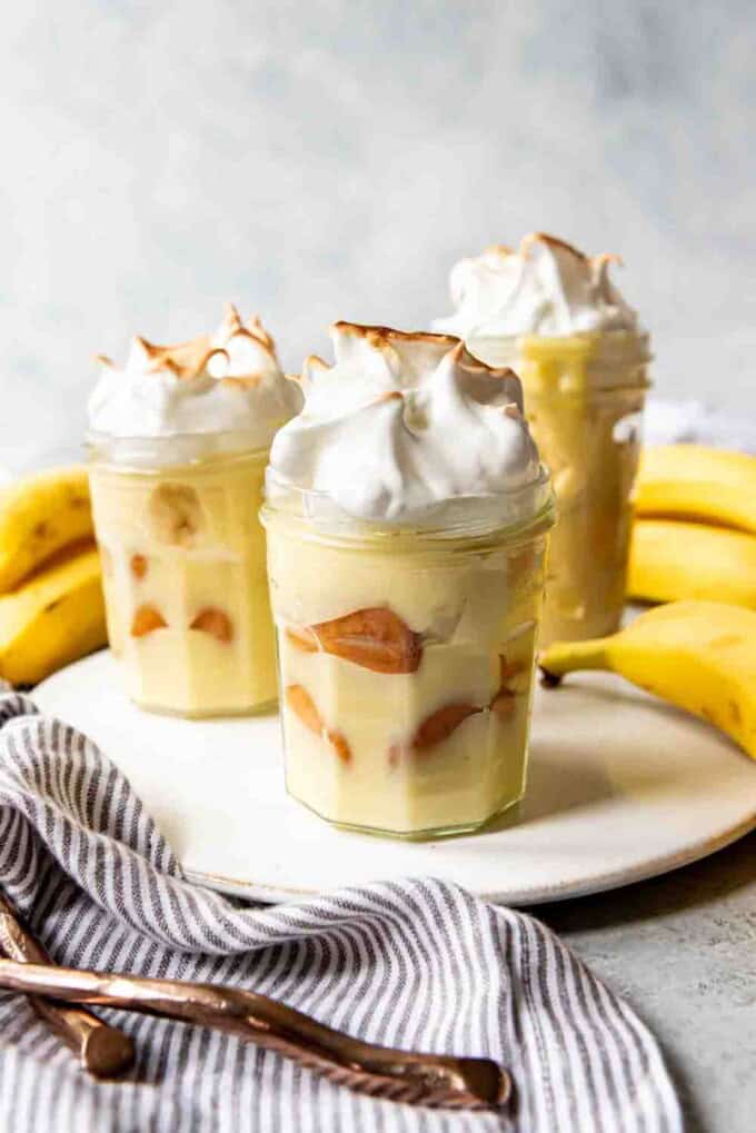 Serving jars filled with southern banana pudding.