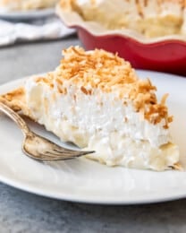 An image of a slice of coconut cream pie made from scratch.