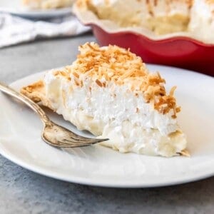 An image of a slice of coconut cream pie made from scratch.