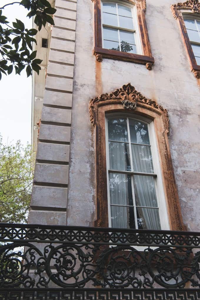 An image of the windows of an old mansion in Savannah, Georgia.