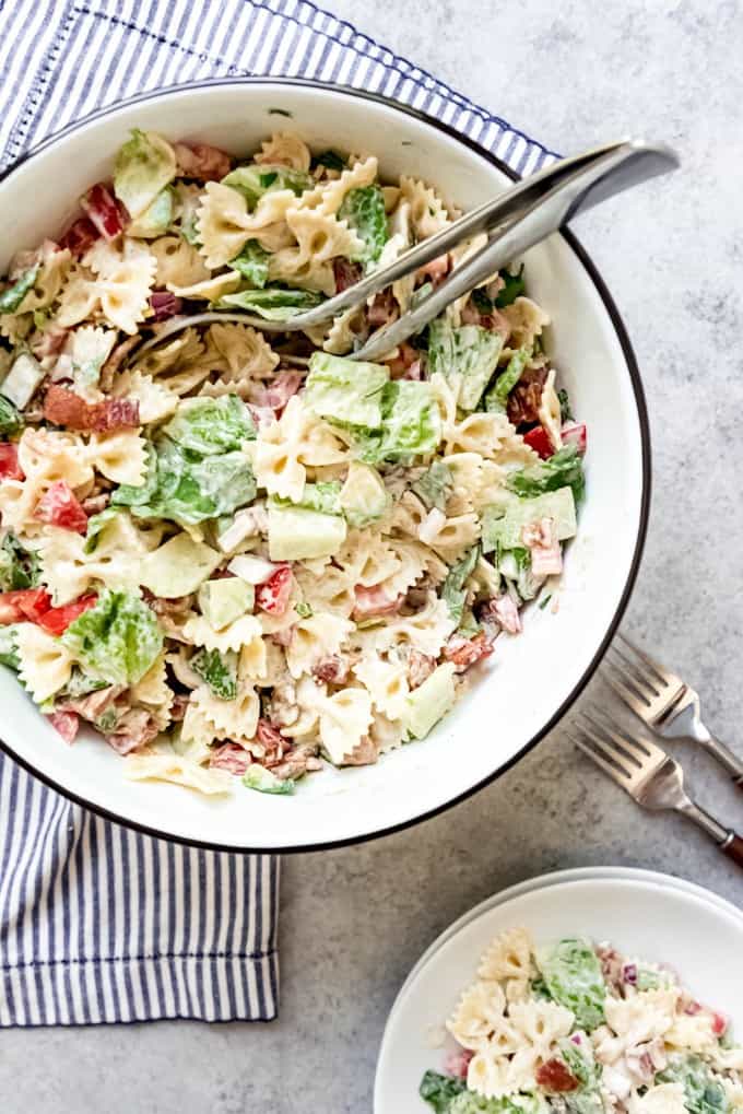 An image of an easy summer side dish of pasta salad made with bowtie pasta.