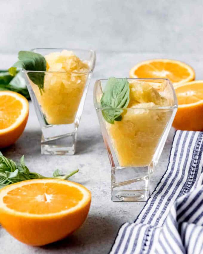 An image of two glasses filled with orange granita.