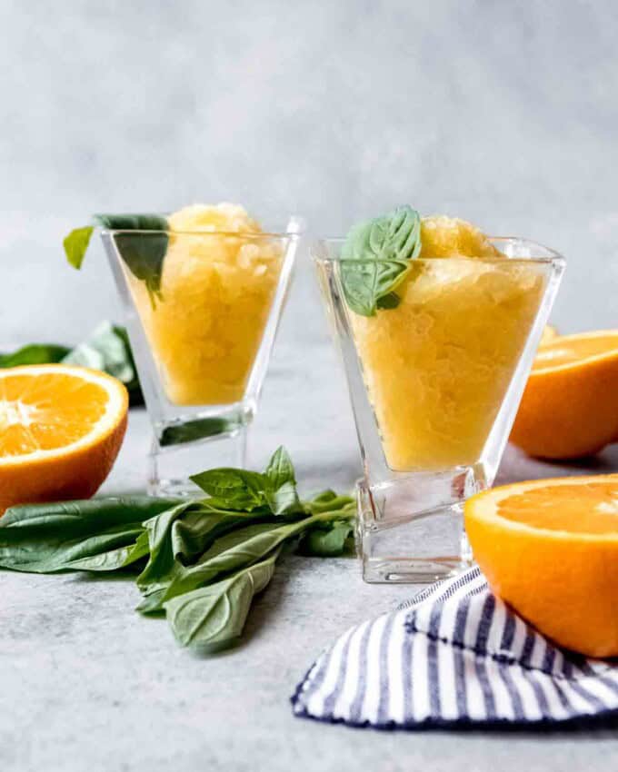 An image of two glasses filled with orange granita.