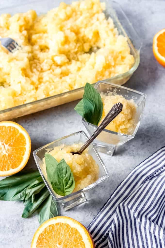 An image of homemade orange granita with basil and coconut flavoring.