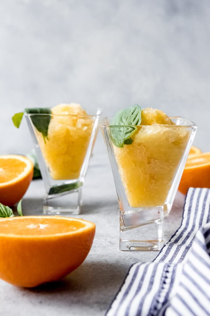 An image of two glasses filled with orange granita.