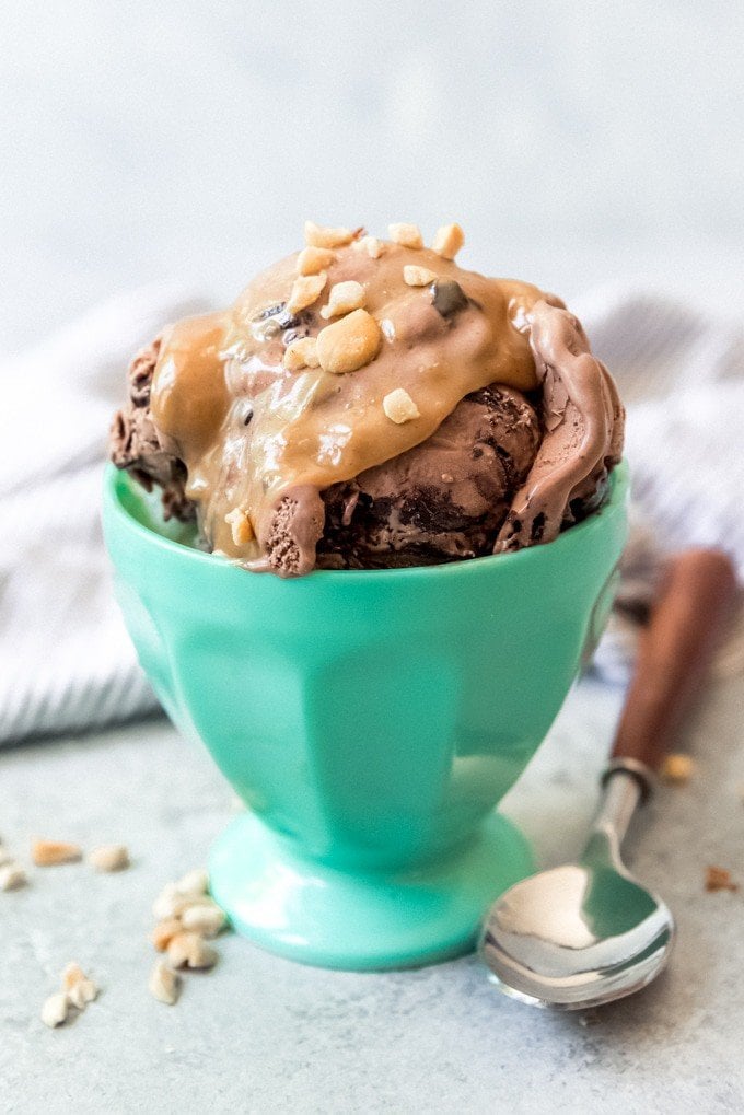 An image of a bowl of ice cream with homemade peanut butter sauce on top.