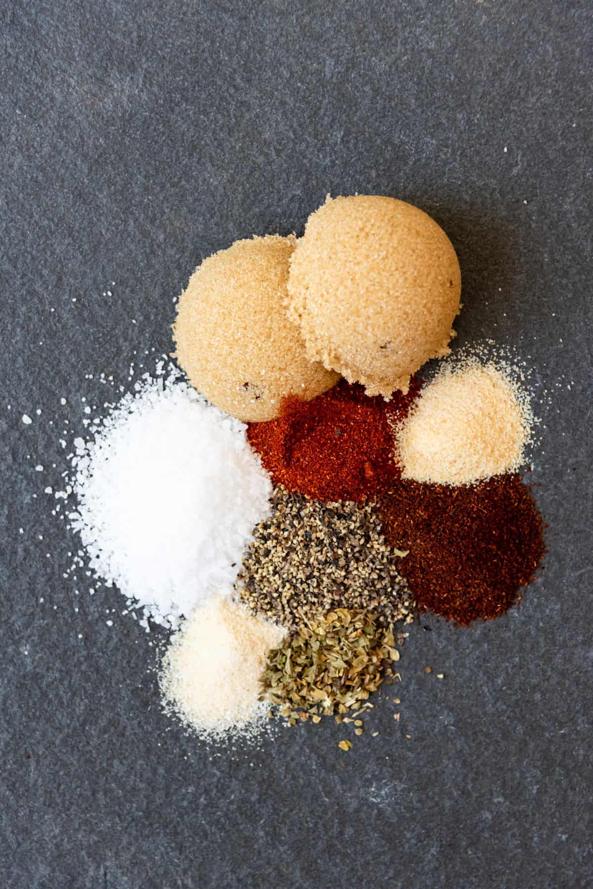 An image of the ingredients in a sweet bbq pork rub.