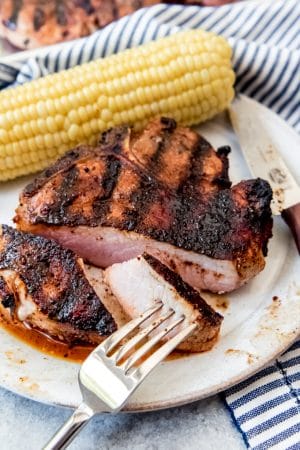 grilled pork chops with a bite missing