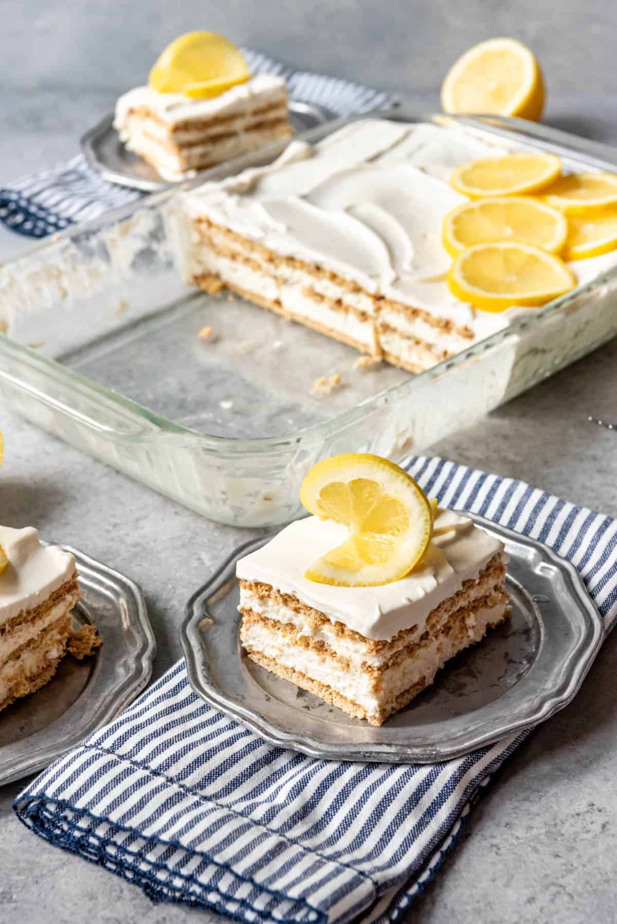 A slice of lemon icebox cake on a plate.