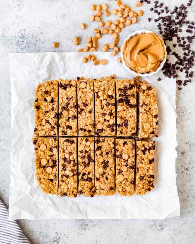 An image of homemade chewy peanut butter granola bars with mini chocolate chips.