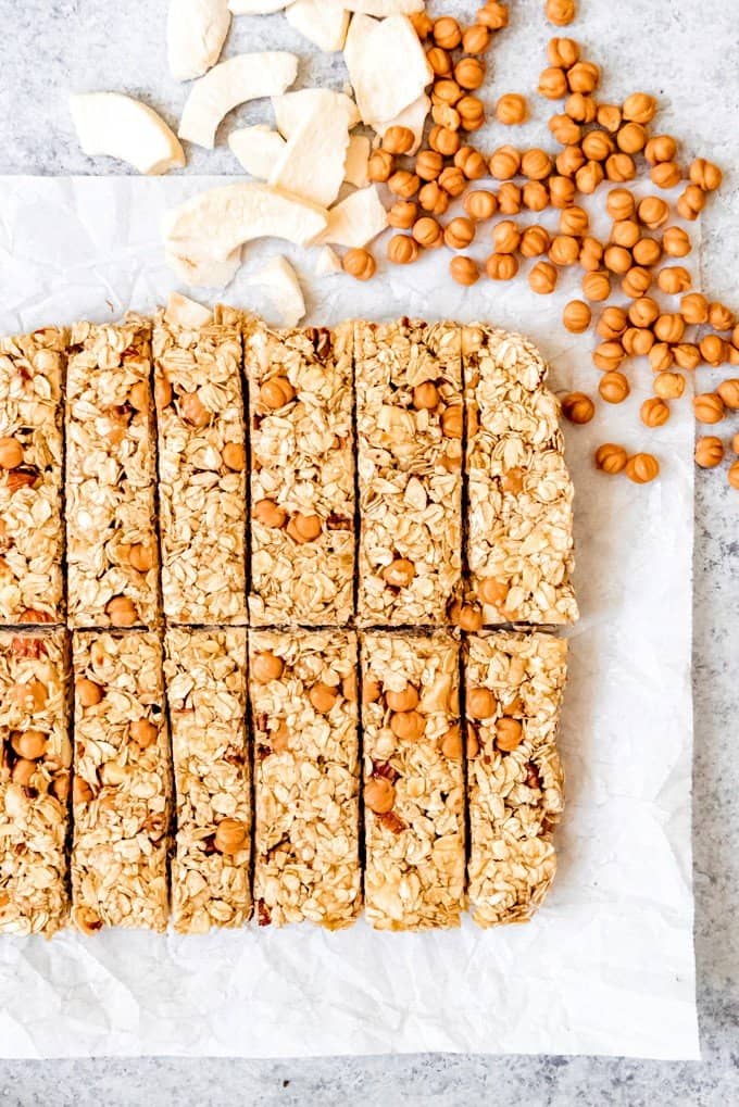 An image of granola bars made with caramel bits and dried apple slices.