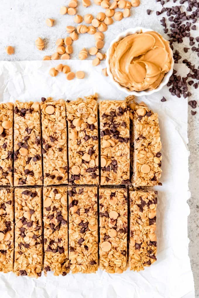 An image of homemade chewy peanut butter granola bars with mini chocolate chips.