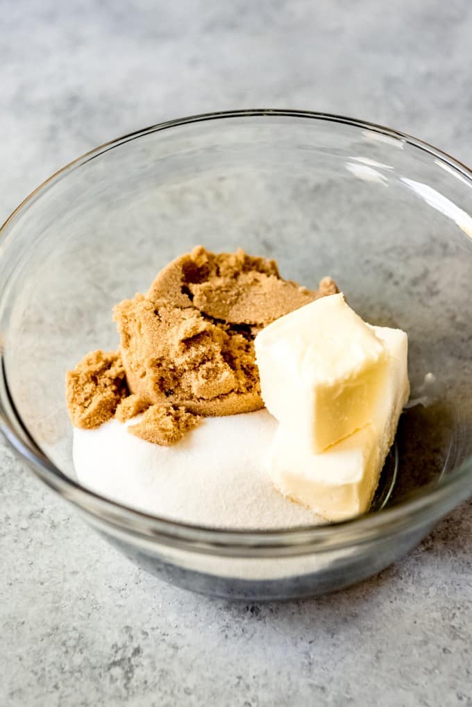 A bowl of sugars and softened butter.