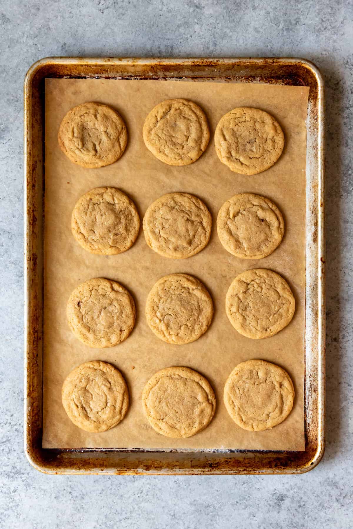 An overhead image of baked cookies on a baking sheet.