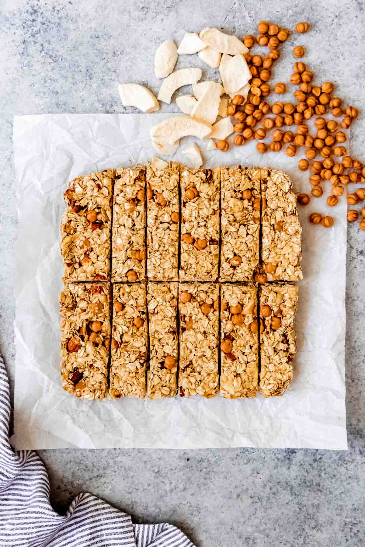 An image of caramel apple granola bars right after they have been cut into twelve rectangles.