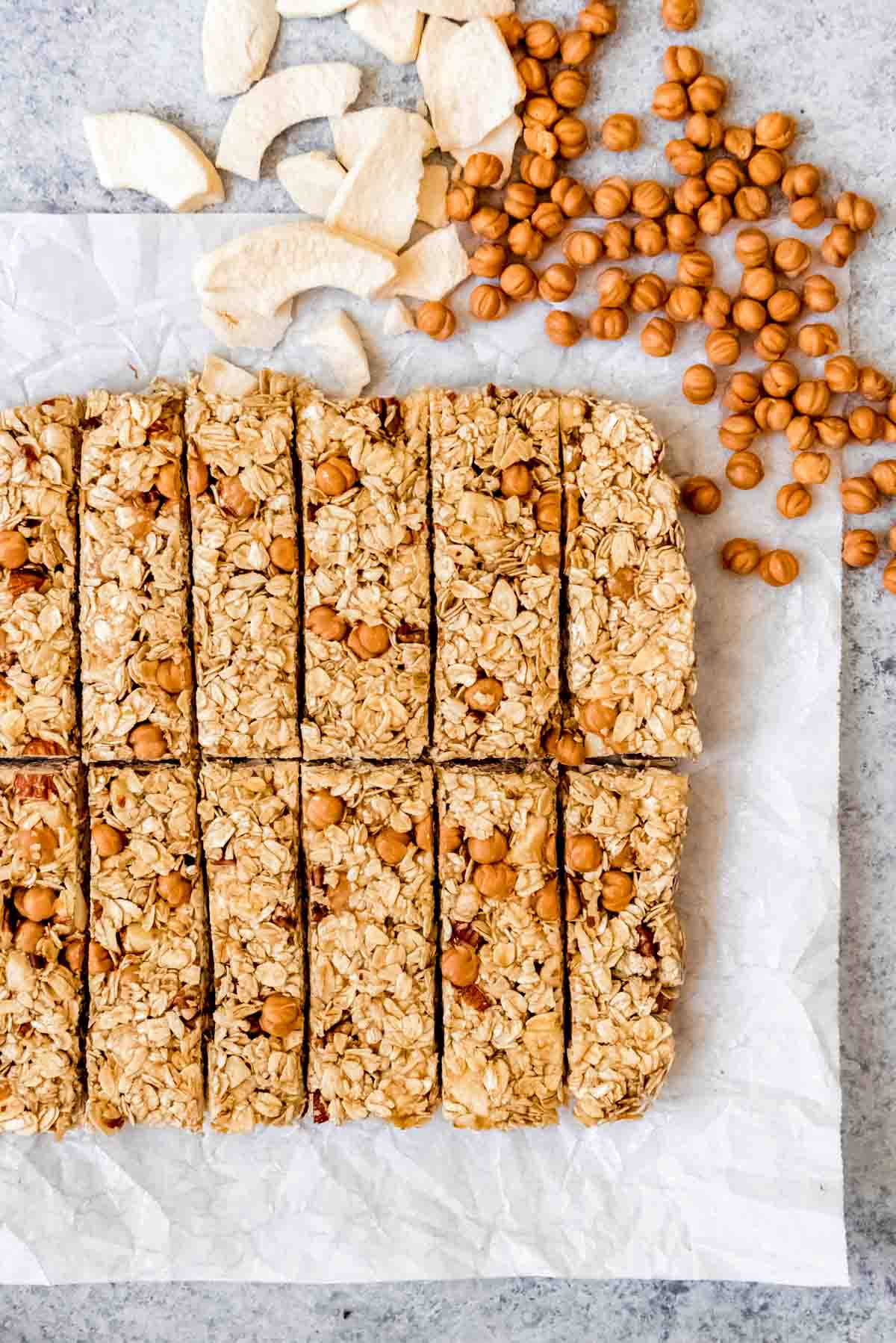 An image of granola bars made with caramel bits and dried apple slices.