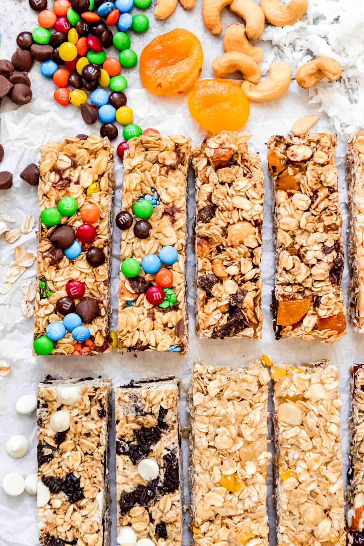 An image of four different types of homemade granola bar variations arranged side-by-side.