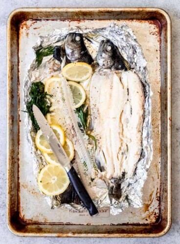 An image of baked rainbow trout with the bones removed.