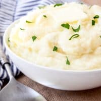 An image of creamy, homemade mashed potatoes in a serving bowl.