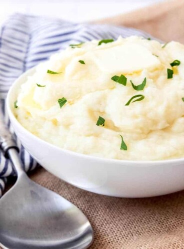 An image of creamy, homemade mashed potatoes in a serving bowl.