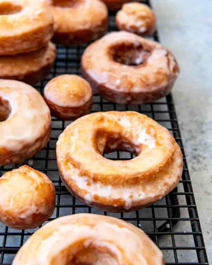 An image of glazed old-fashioned sour cream donuts.