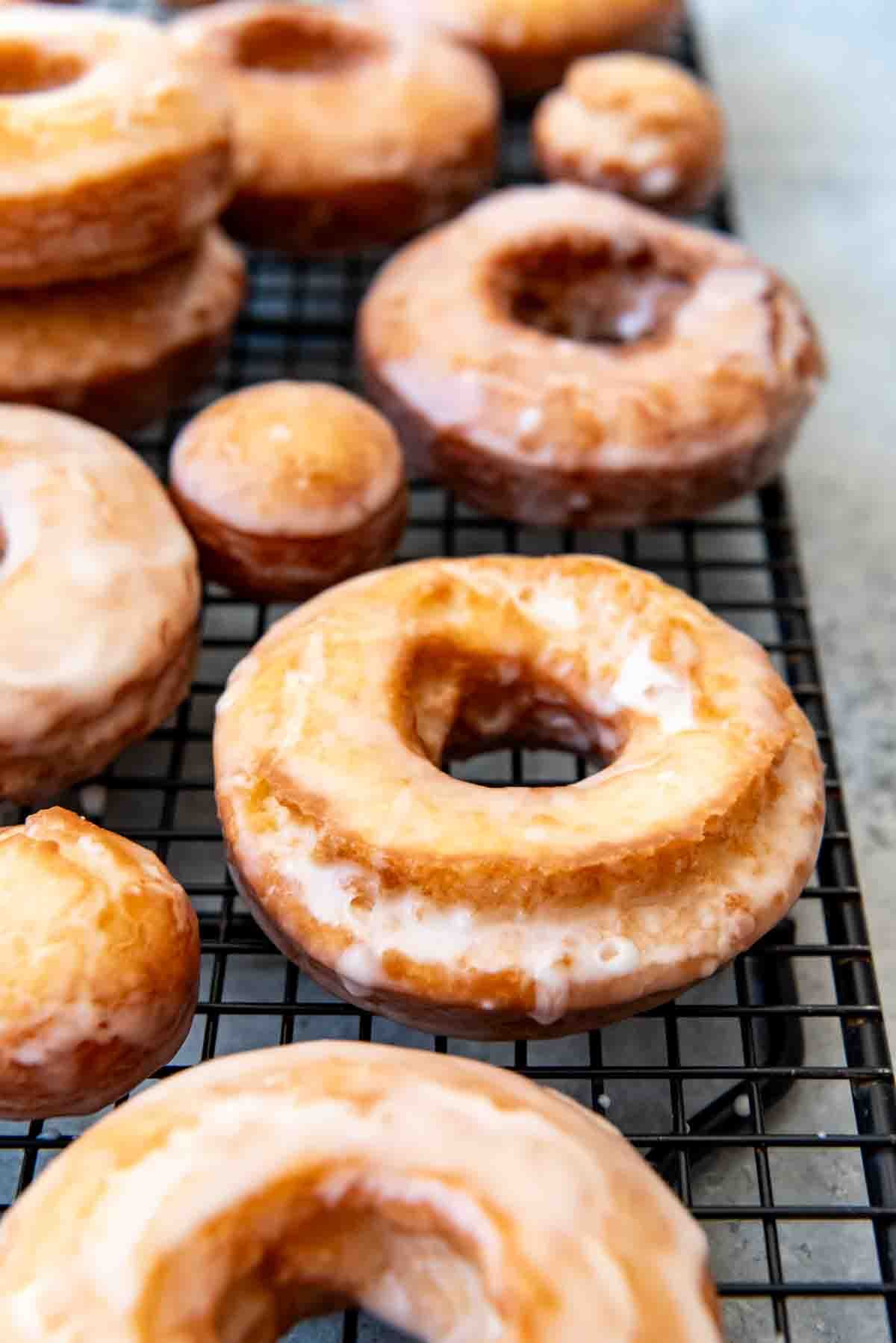 An image of glazed old-fashioned sour cream donuts.