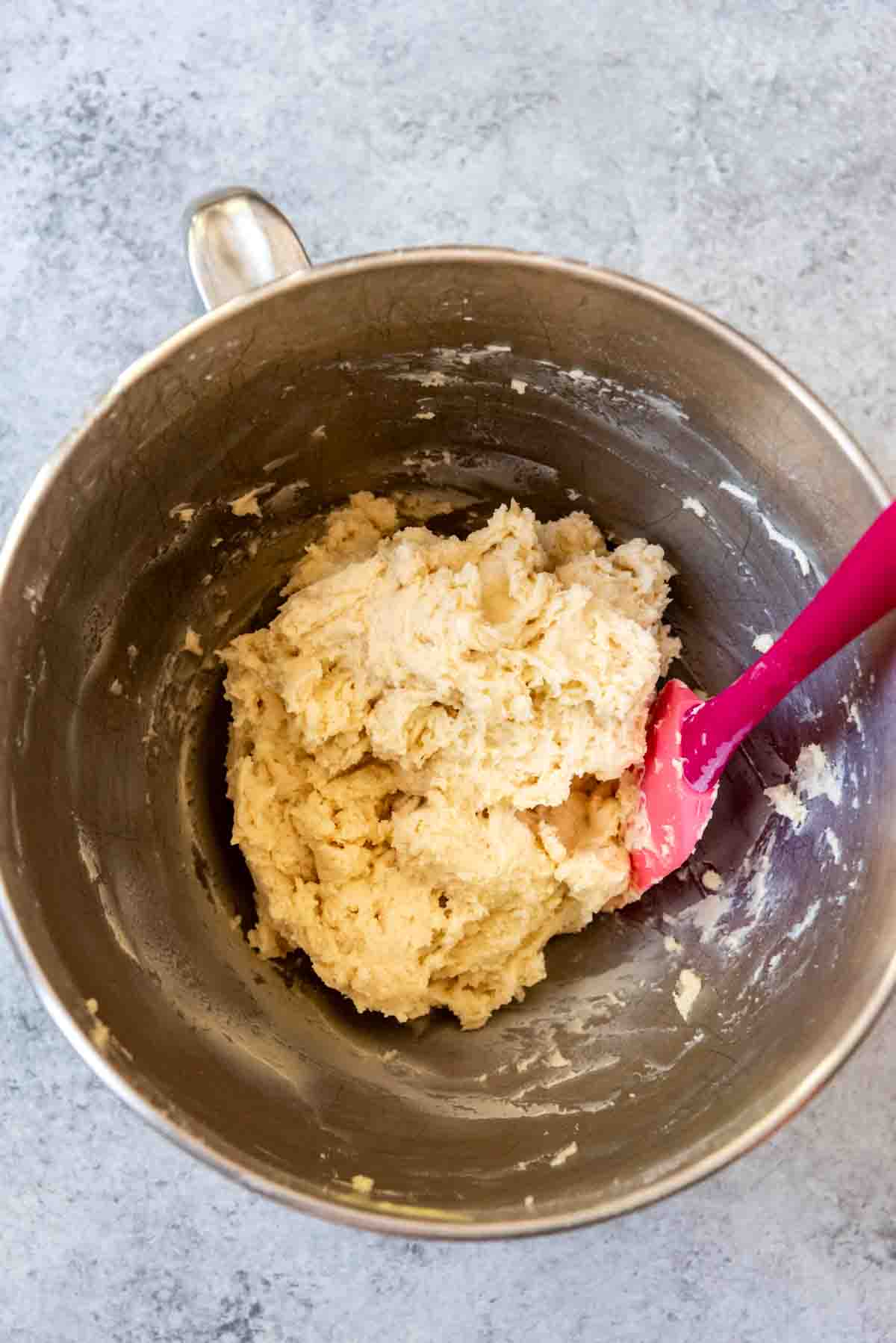 Old-fashioned sour cream doughnut dough in a bowl.